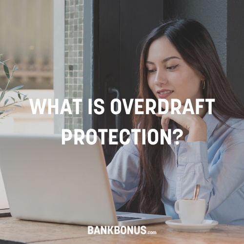 a lady reading about how overdraft protection works on her computer