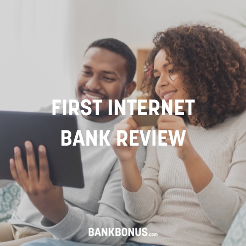 couple reading a first internet bank review on a tablet